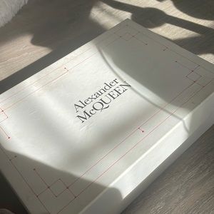 Alexander McQueen worn once for graduation still have the original box.